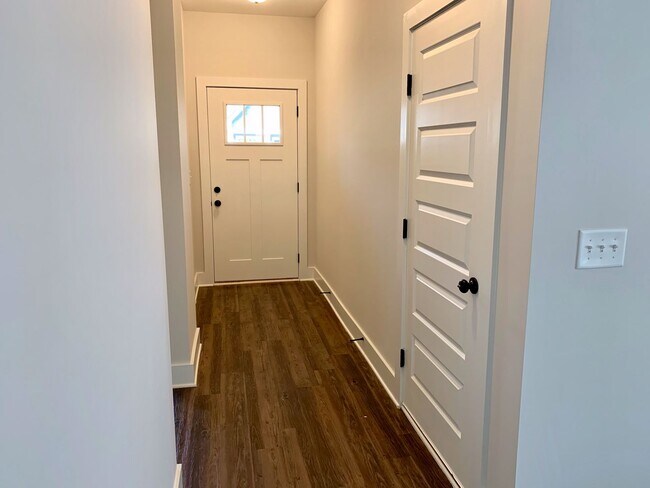 Building Photo - One level home with GARAGE and FENCED BACKYARD!