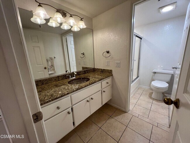 Building Photo - Welcome to this beautifully situated first-floor end unit