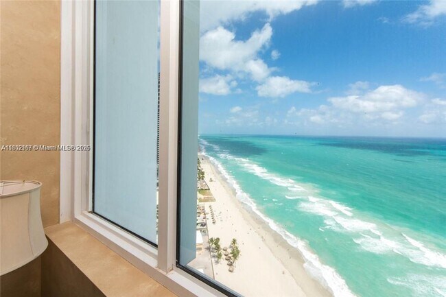 Building Photo - 18201 Collins Ave