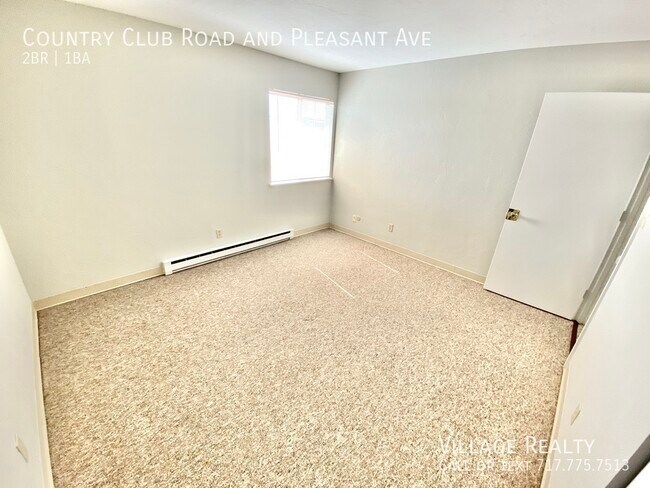 Building Photo - 609 Country Club Rd