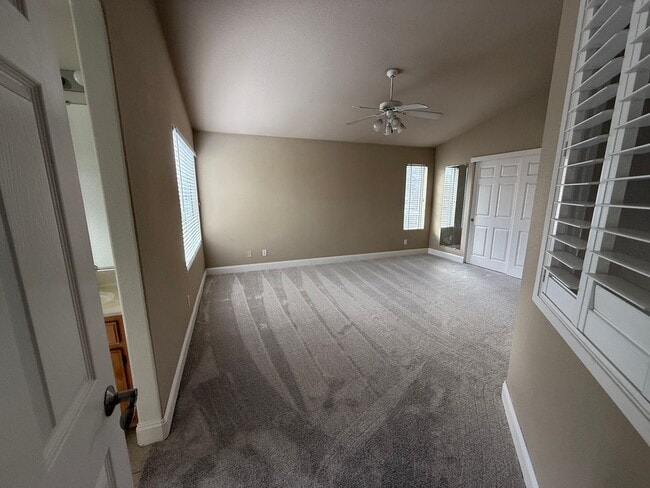 Building Photo - Gated 3BR|2.5BA|1508SF|2 Car Garage| Tenant pays $175 for WS&G | Community Pool, Clubhouse, & Fis...