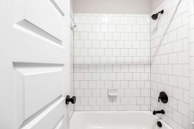 Building Photo - "Spacious 4-Bedroom Sanctuary with Cozy Fireplace in San Antonio's Prime Location!"