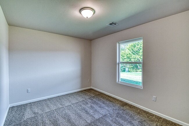 Building Photo - Brand New Construction!  Lawn care provided!