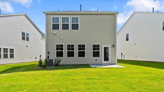 Building Photo - Be the 1st to live in this stunning, never...