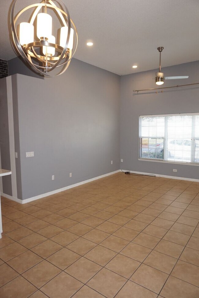 Building Photo - Designer 3/2 with 2 Car Garage in Desirabl...