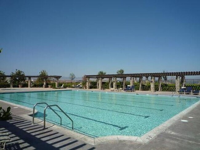 Building Photo - Spacious 4-Bedroom Home with Downstairs Bed/Bath & Full Community Access in Valencia!