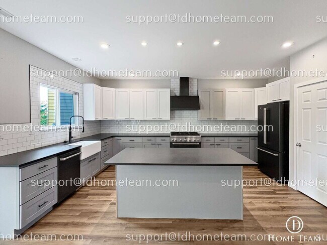 Building Photo - "Spacious 3-Bed Oasis in Kent with Elegant...