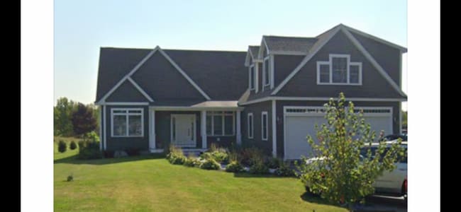 Main home from street-rental unit attached to right side - 17 Winn Rd