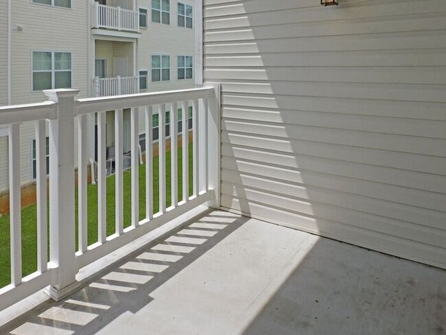 Building Photo - Pet Friendly Condo with Private Balcony and 1 Car Garage