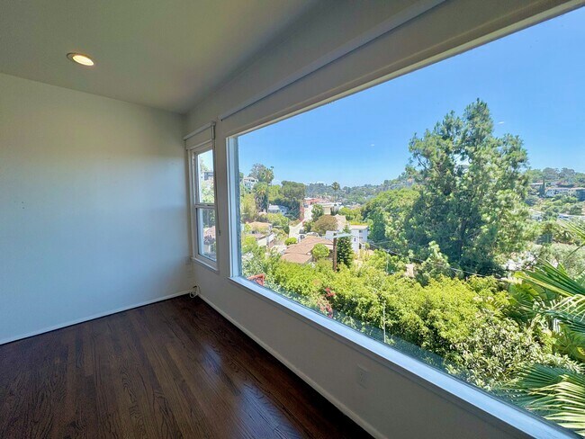 Custom roller blinds throughout. - 1672 Rotary Dr