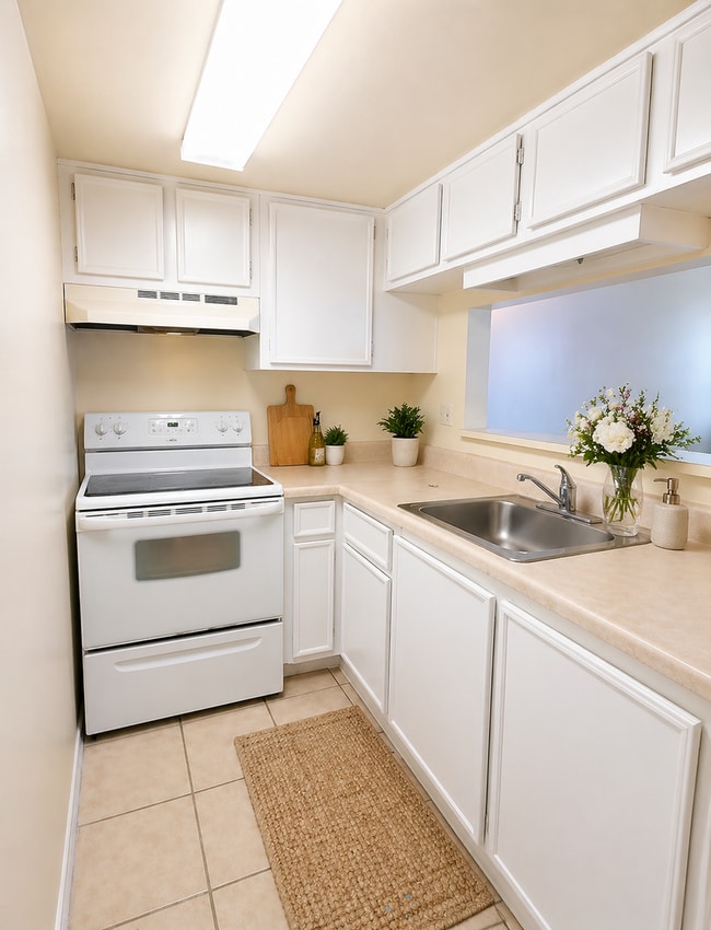 Building Photo - Welcome to the Waterside Community Condo — your opportunity to stop renting and start owning in T...