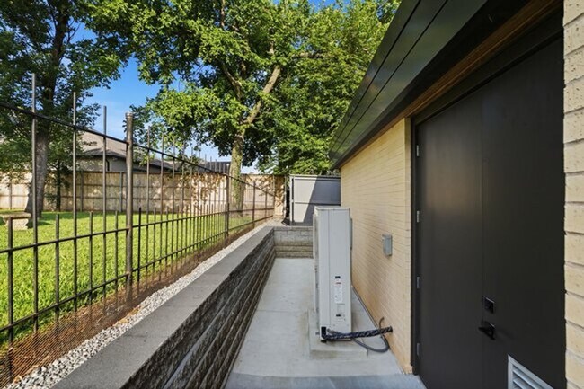 Building Photo - Experience contemporary luxury in this exceptional custom-built Midtown Tulsa residence, where so...