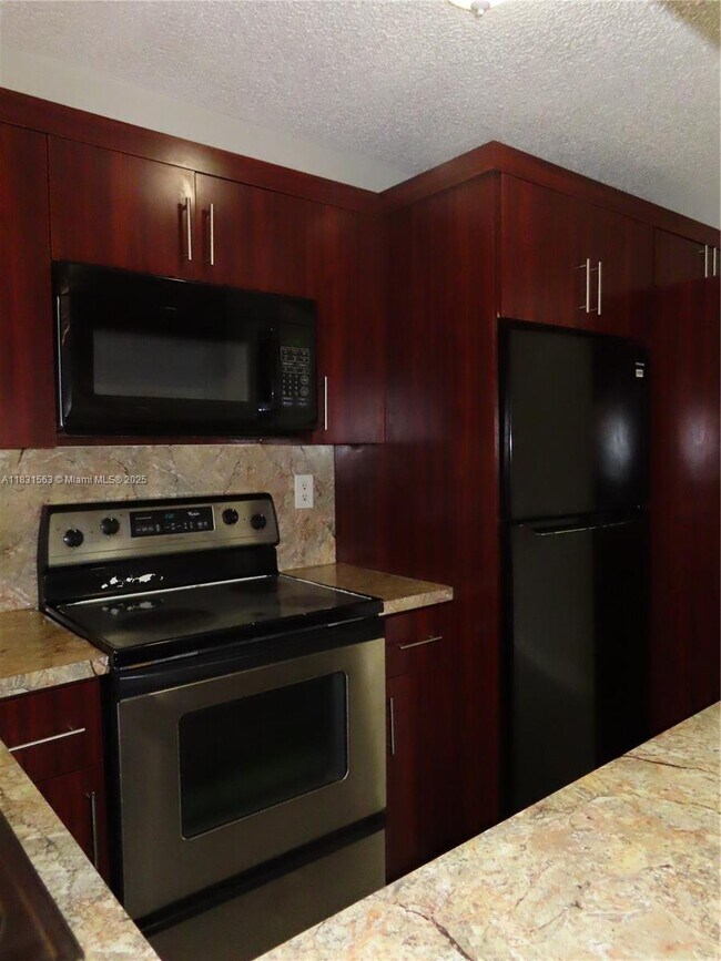 Building Photo - 13894 SW 65th Terrace