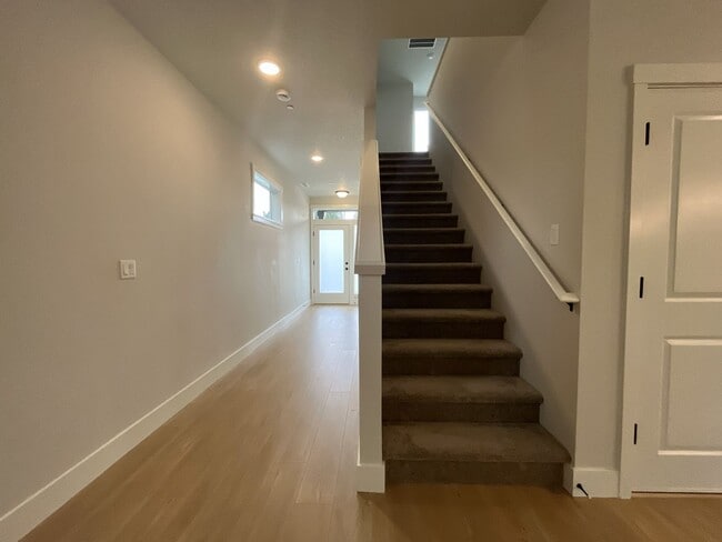 Building Photo - Modern 2025-Built 4 Bedroom Home with EV Charging, 5kW Solar, Open-Concept Living, Scenic Outdoor...