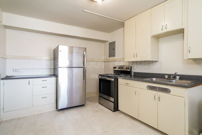 Building Photo - 1301-1311-1311 6th Ave