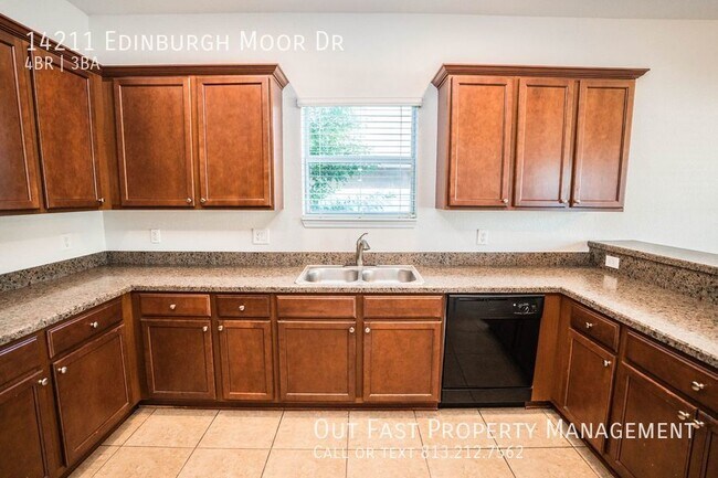 Building Photo - Spacious and Modern 4-Bedroom Home with a ...