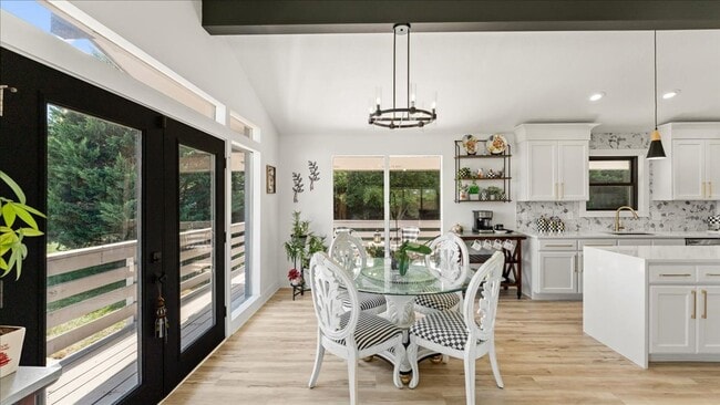 Building Photo - Renovated Mid-Century Modern Home in Belmont West with Finished Basement & Fenced Yard