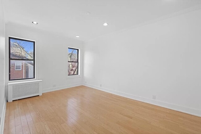 Building Photo - 44-14 Newtown Rd