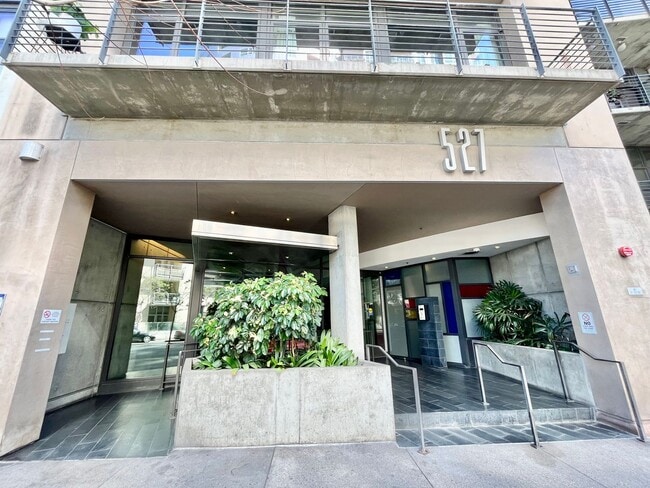 Building Photo - Stunning Corner Loft in East Village with Floor-to-Ceiling Windows & City Views!