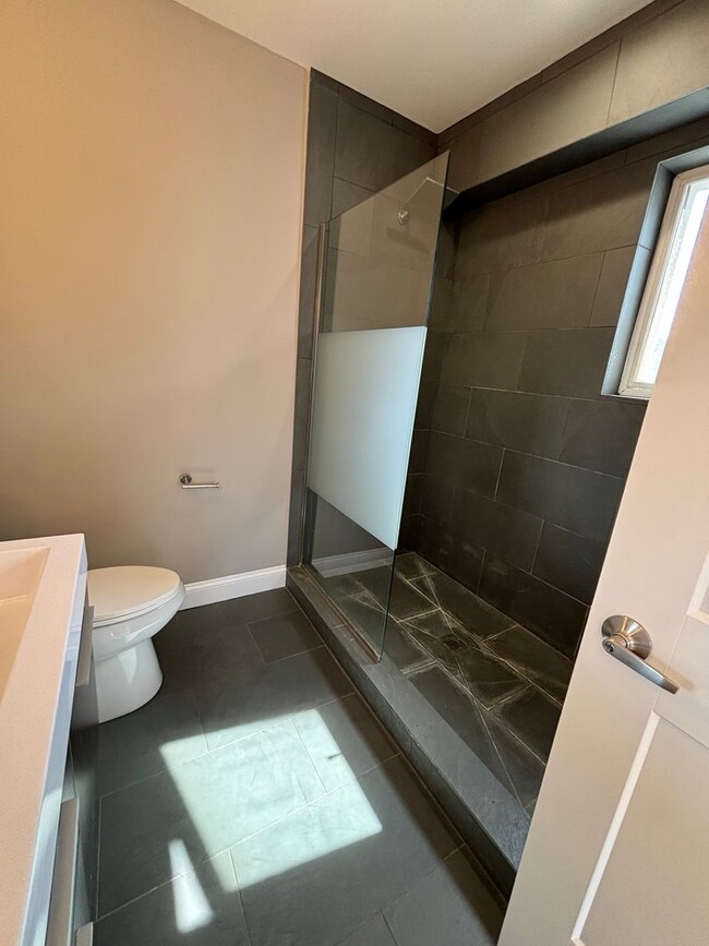 Building Photo - Gorgeous 4 Bedroom house with Three Roof-D...