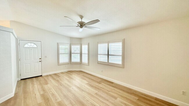 Building Photo - Light, Bright, and Freshly Updated Home in the Gated & Desirable Champagne Village 55+ Community!