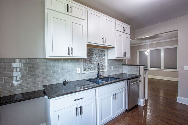 Building Photo - Adorable Brick 4 Bedroom Ranch with Finish...