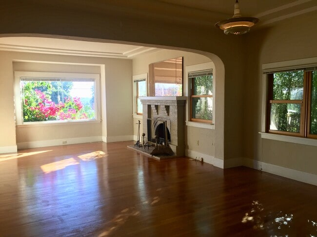 living room and functioning fire place - 2465 Cole St