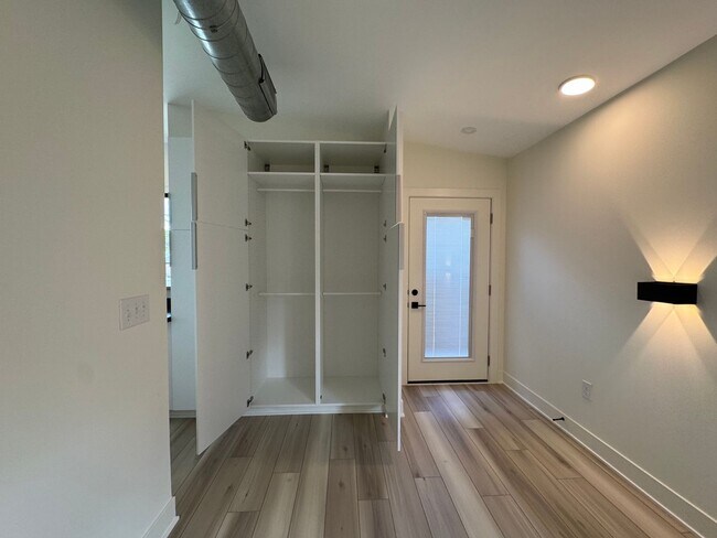 Building Photo - Vaulted Ceilings & Hardwood Floors in This Charming Indianapolis L