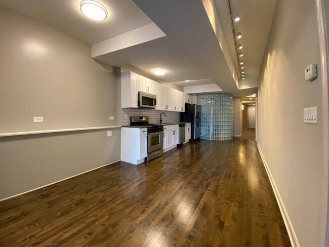 Stunning kitchen space with hardwood floors - 2140 N Halsted