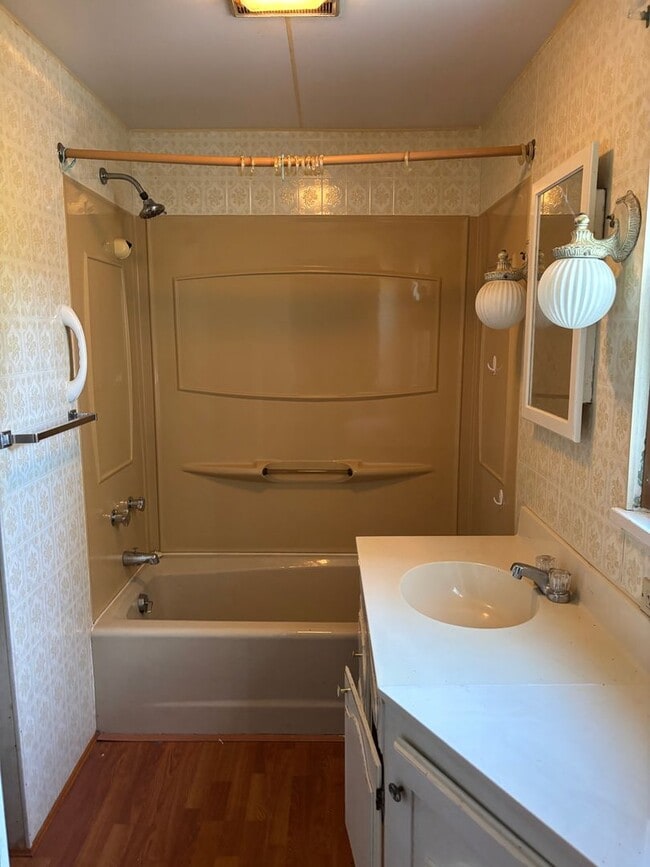 Building Photo - Charming 2-Bedroom Single-Family Home with Garage and Off-Street Parking