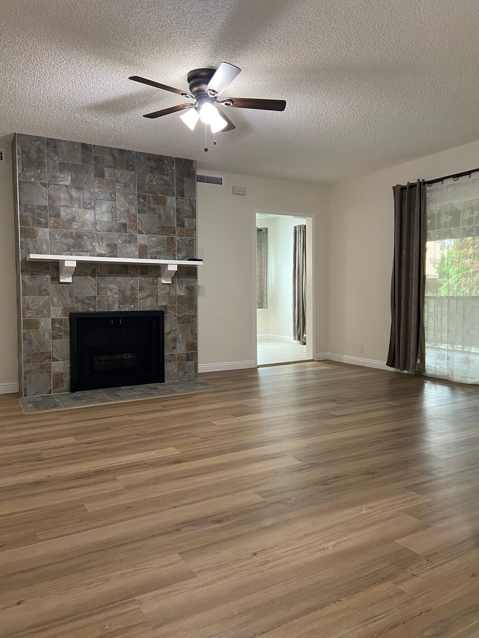 living room to dining area - 1161 W Duarte Rd