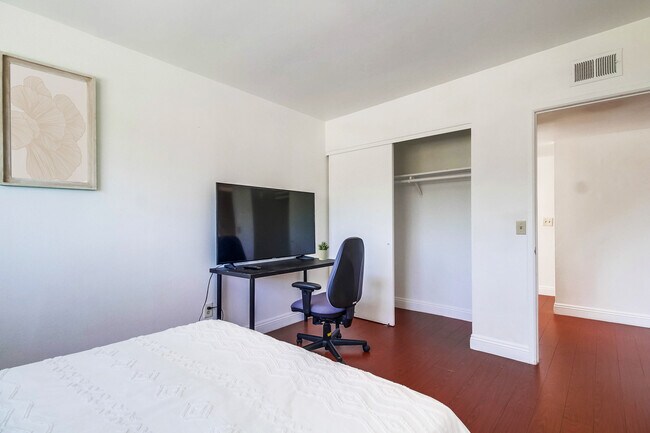You get plenty of work done in this workstation w/ an ergonomic chair & office desk - 2304 E 14th St