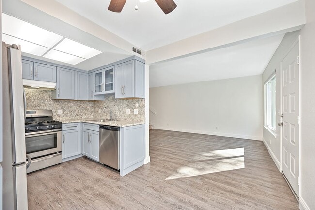 Building Photo - Beautifully Updated 2 Story Unit