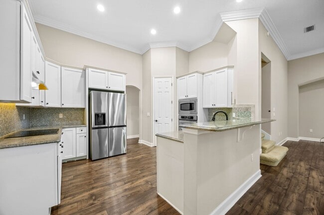 Building Photo - Luxury Living in Amelia National – Resort-...