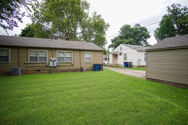 Building Photo - Gorgeous duplex unit on large lot with garage -- NO PETS ALLOWED