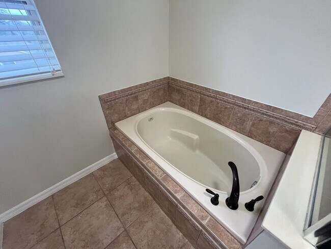 Building Photo - Corner Lot, 4 Bedroom Home with Pool at No...