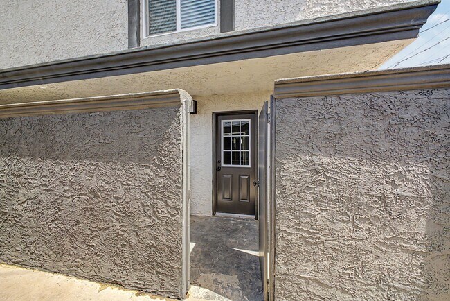 Building Photo - Spacious 2 Bed + Bonus Room | Large Private Yards | Covered Parking | 8 Weeks Free Rent!