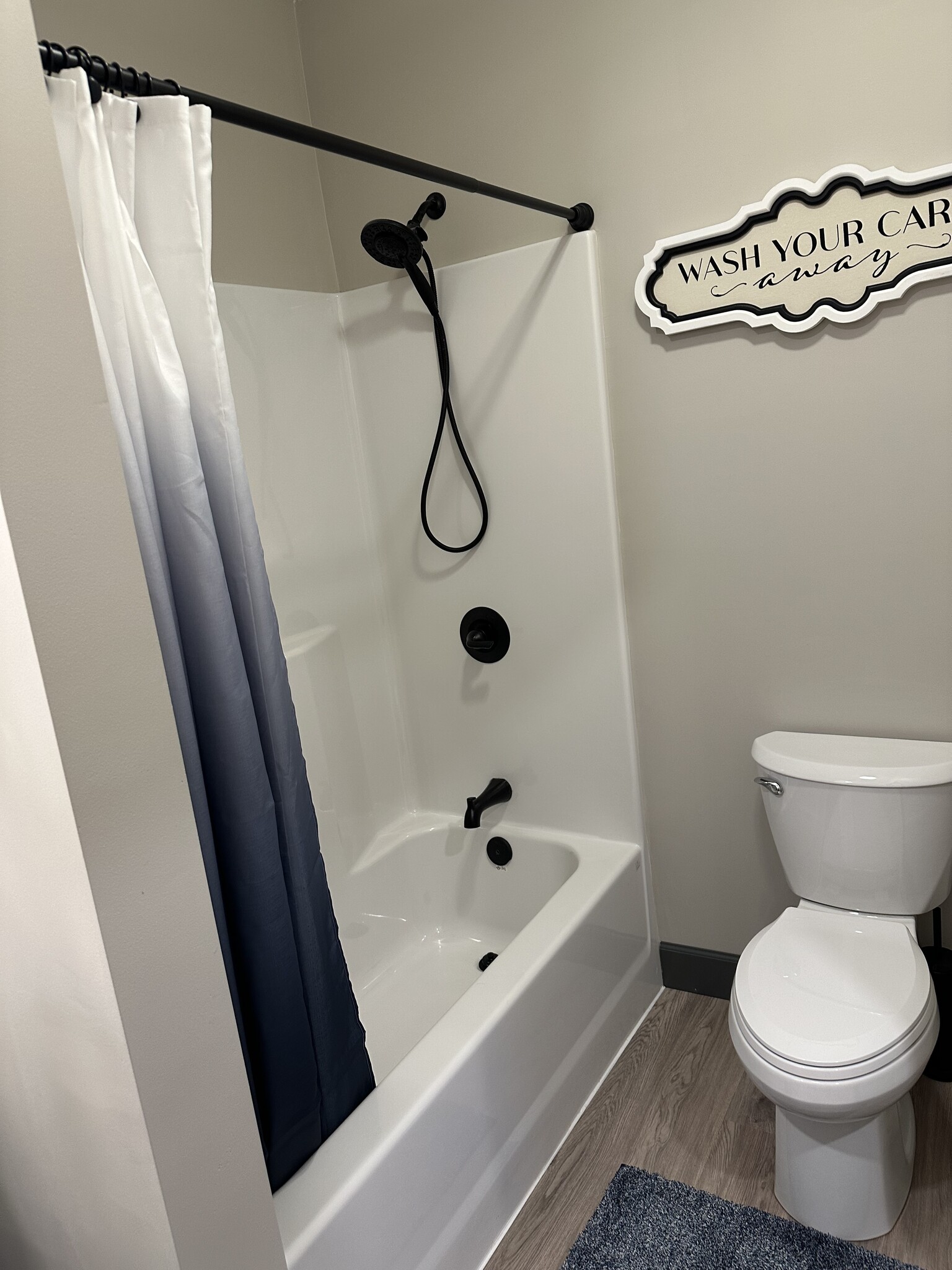 Tub shower with detachable shower head - 200 Jaycee Dr