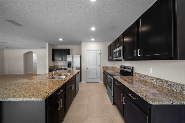 Building Photo - Move-In Ready! ***2 WEEKS FREE RENT**Beautiful 4-Bedroom Home with Modern Finishes & Room to Grow