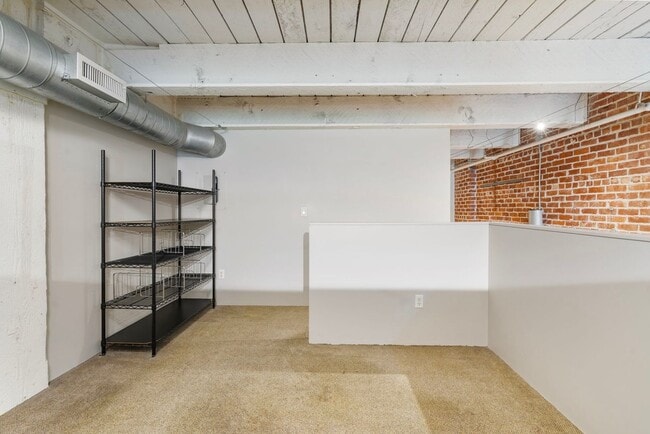 Building Photo - Historic Chown Pella Lofts - east facing studio w/parking/most utilities/rooftop deck