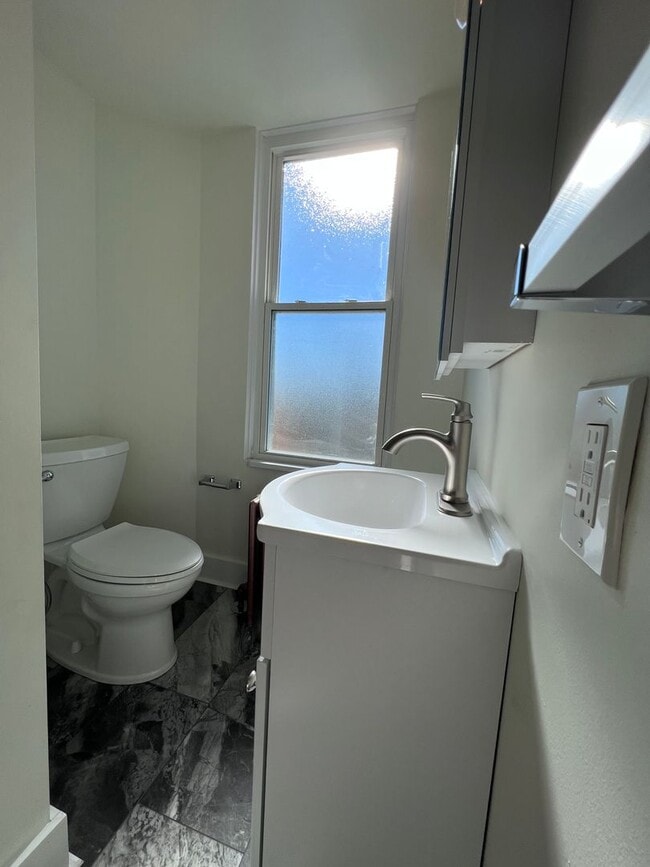 Building Photo - Updated 3 BR 2.5 bath house now available!