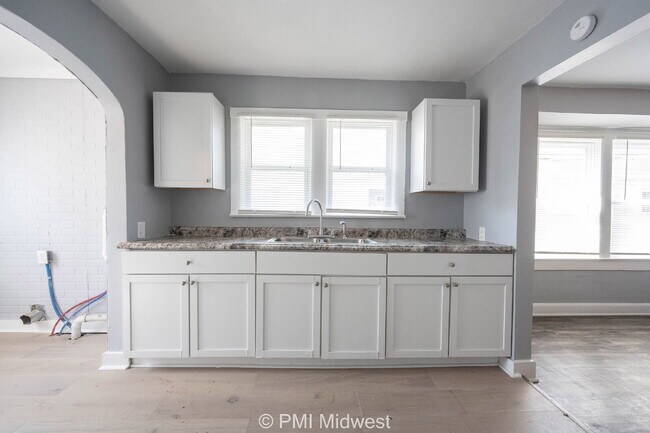 Building Photo - Coming Soon – West Side Convenience, Indy Access