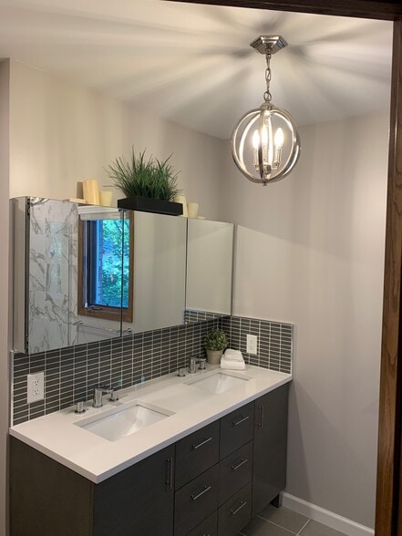 Renovated primary en-suite bath - 5536 Village Dr