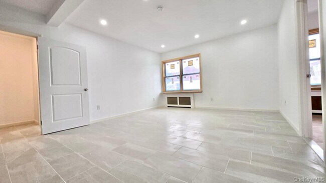 Building Photo - 63-87-87 Fitchett St