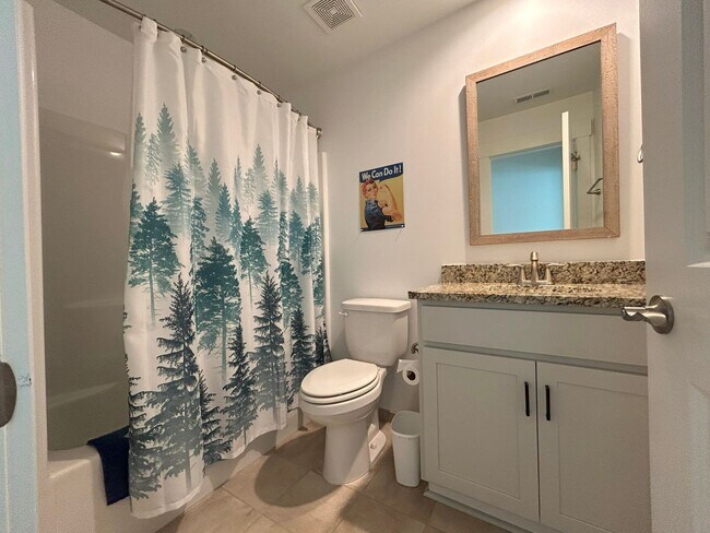 Building Photo - Beautifully appointed furnished 4 bedroom ...
