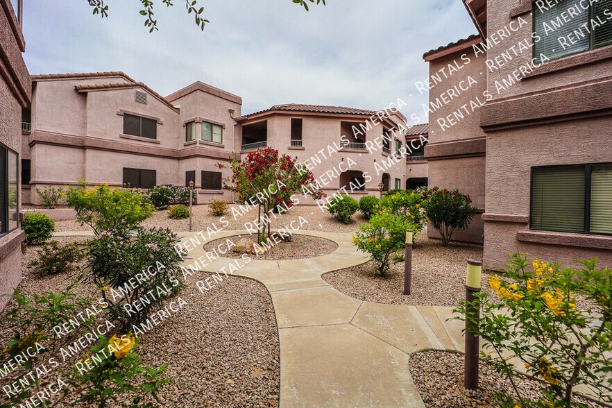 Building Photo - 9555 E Raintree Dr