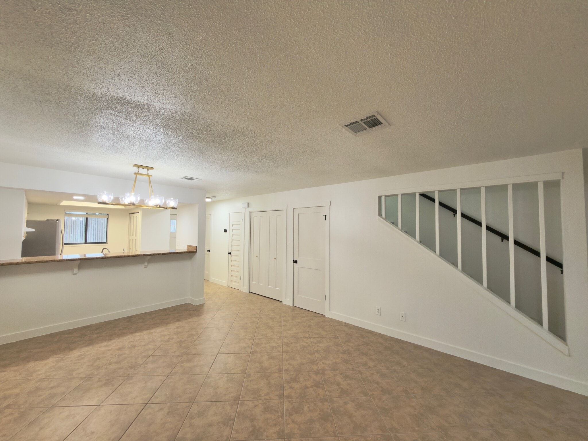 Living + dining room - 27 Court Dr