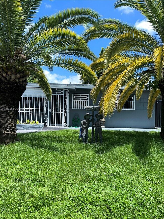 Building Photo - 5891 W 9th Ln