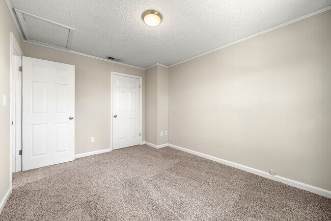 Building Photo - Introducing a Charming End Unit Townhouse ...