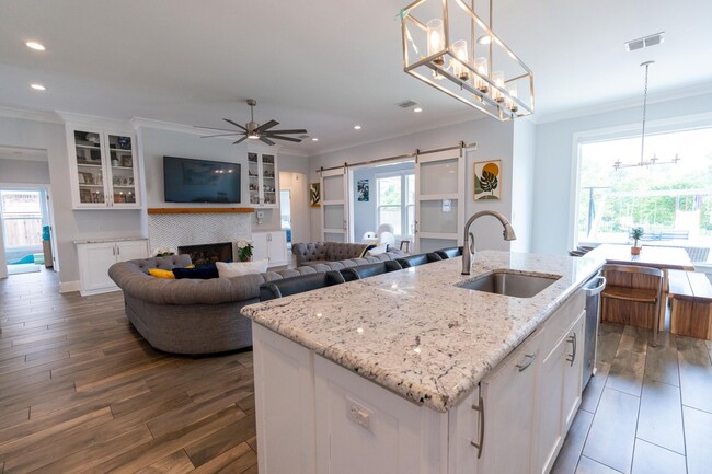 Building Photo - Waterfront Dream in Island Park | 4BR Retreat with Fire Pit, Flex Space & Backyard Oasis